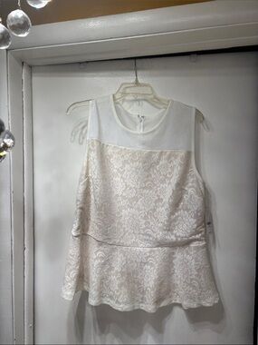 Sleeveless Lace Peplum Top in Cream